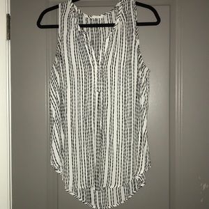 Sleeveless black and white blouse